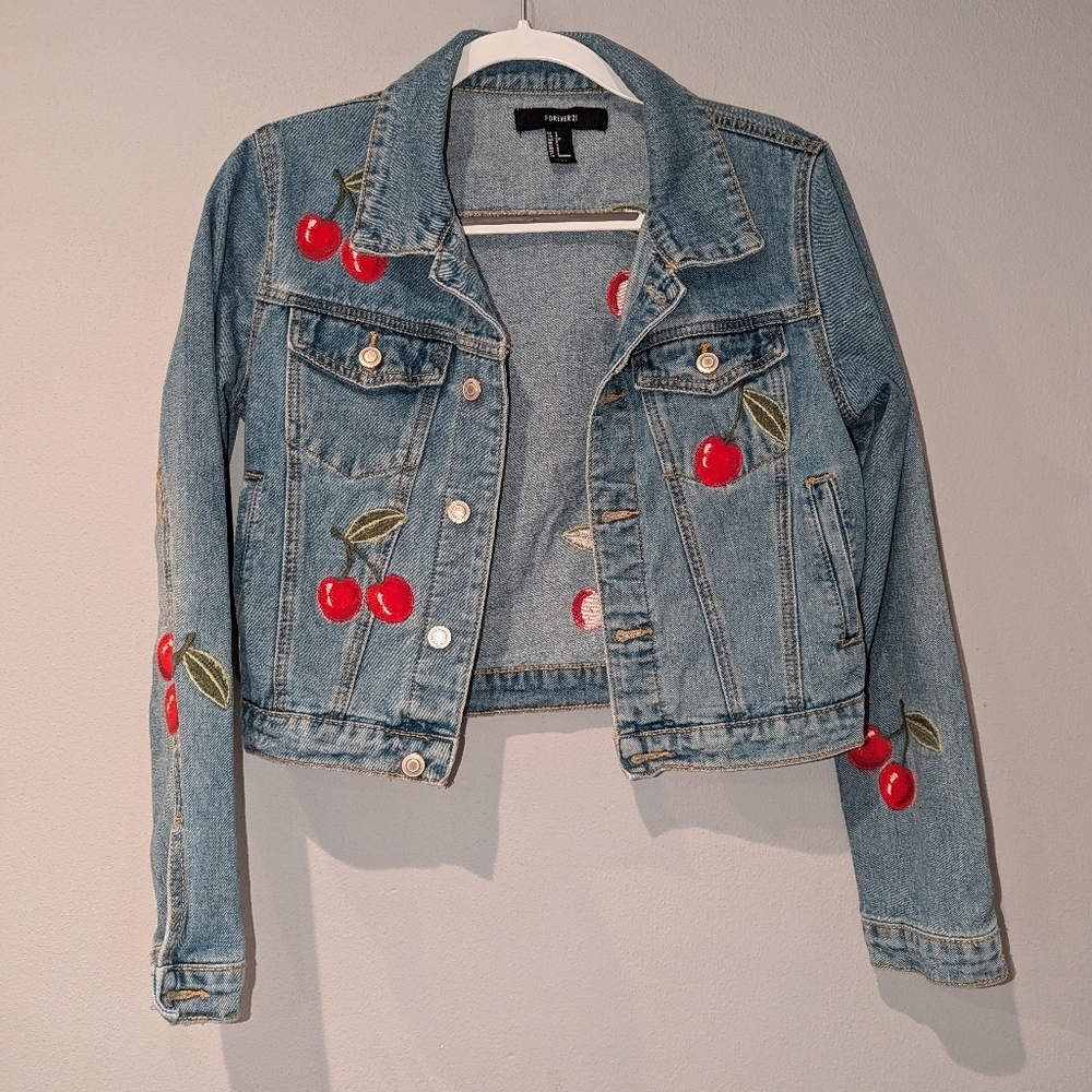 Forever 21 denim jacket with cherries size small. Juniors size small.